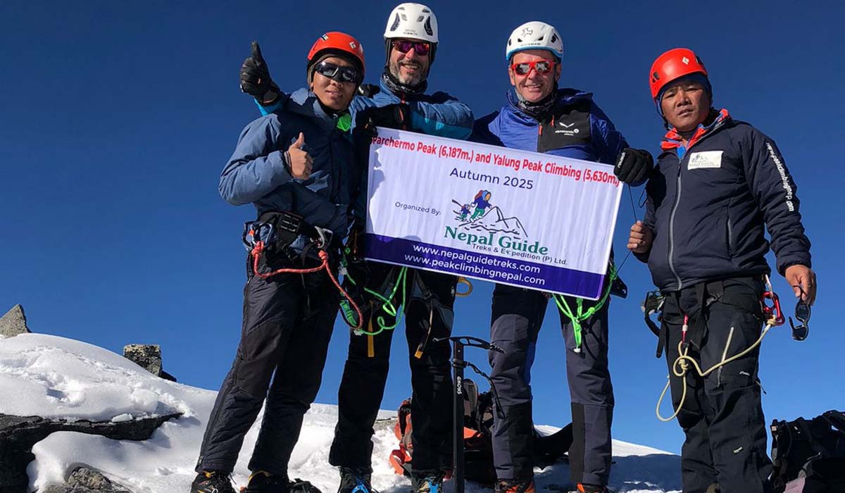 Pachermo Peak Climbing in nepal with guest at the top