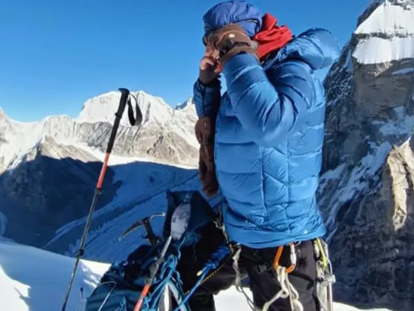 Climber Putting Gears At Pachermo And Kyajo Ri Peak Climbing
