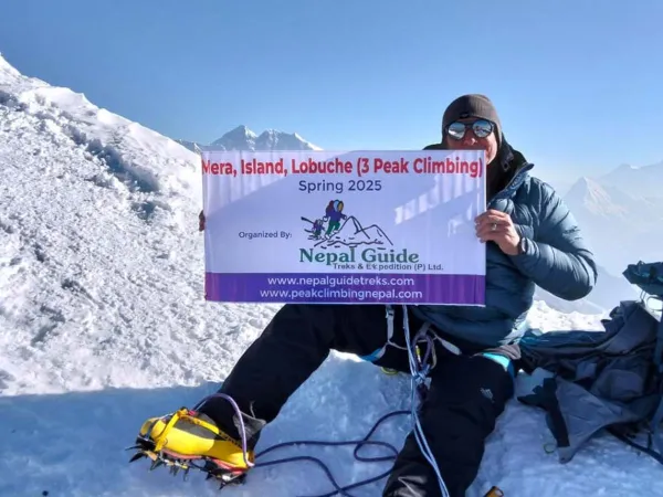 Mera Island And Lobuche Peak Climbing With Banner At The Top