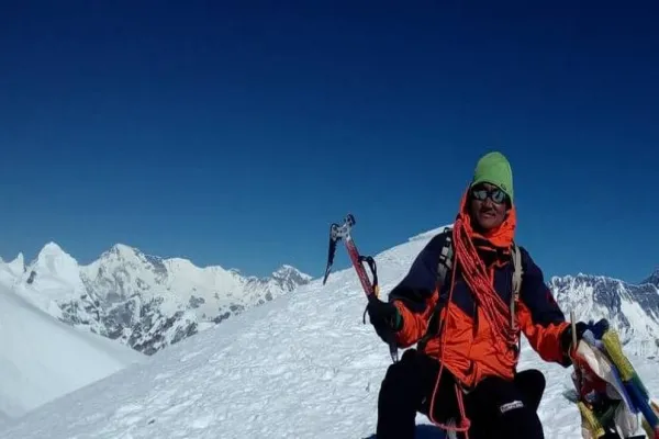 Kusum Kanguru climbing with the sherpa