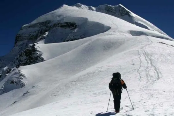 tukuche peak and climber